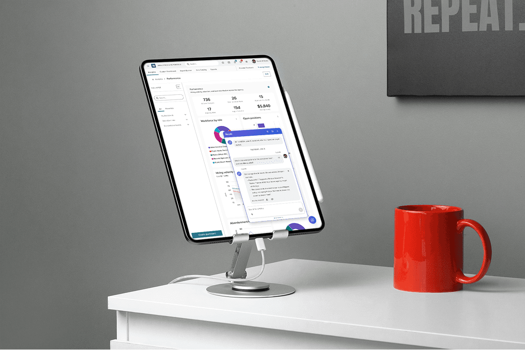 AI Assistant interface on tablet with red mug